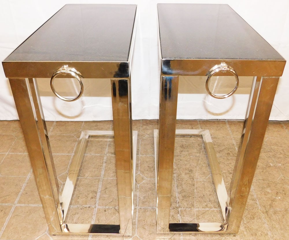 Pair of Polished Black Marble Top & Chrome Cantilever Side Tables: Pair of Polished Black Marble Top & Chrome Cantilever Side Tables . 24 1/2" H 11 1/4" W 24" D ALL DESCRIPTIONS AND ANY CONDITION STATEMENT GIVEN BY LANGSTON AUCTION GALLERY ARE STRICTLY OPINIONS AND L