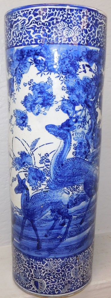 19th Century Blue & White Oriental Porcelain Umbrella Stand with Deer Motif: 19th Century Blue & White Oriental Porcelain Umbrella Stand with Deer Motif. 23 3/4" H 8 1/2" Dia. ALL DESCRIPTIONS AND ANY CONDITION STATEMENT GIVEN BY LANGSTON AUCTION GALLERY ARE STRICTLY OPINIONS
