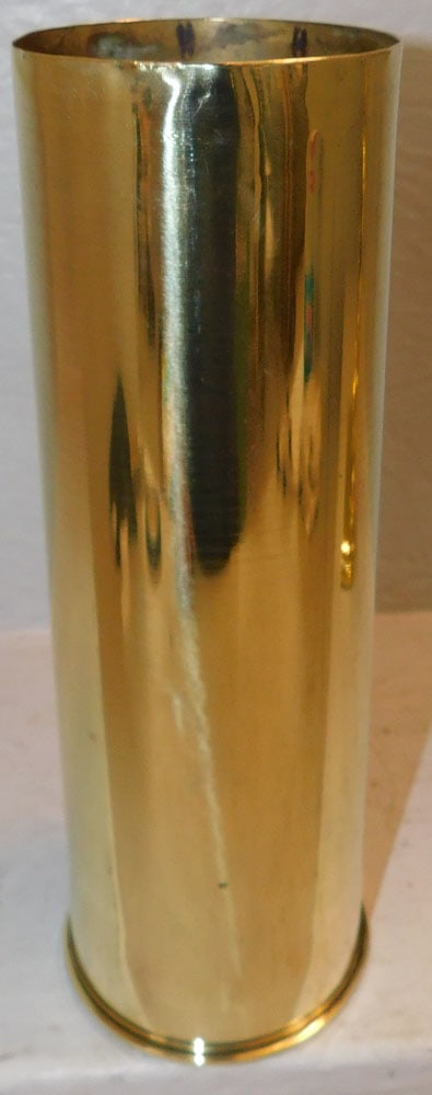 Antique Brass Trench Art Shell Form Vase: Antique Brass Trench Art Shell Form Vase. 11 1/2" H 3 3/4" Dia. ALL DESCRIPTIONS AND ANY CONDITION STATEMENT GIVEN BY LANGSTON AUCTION GALLERY ARE STRICTLY OPINIONS AND LANGSTON'S SHALL HAVE NO