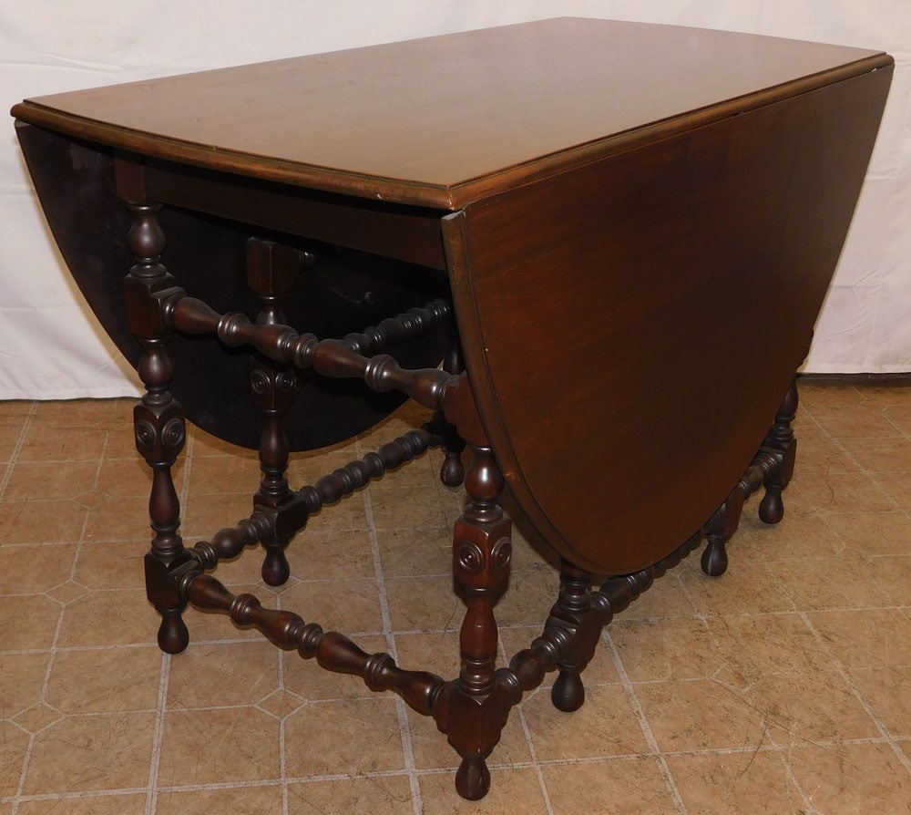 Antique Walnut Gateleg Dining Table: Antique Walnut Gateleg Dining Table. 30" H 24" W 47 1/2" D ALL DESCRIPTIONS AND ANY CONDITION STATEMENT GIVEN BY LANGSTON AUCTION GALLERY ARE STRICTLY OPINIONS AND LANGSTON'S SHALL HAVE NO RESPONSIBIL