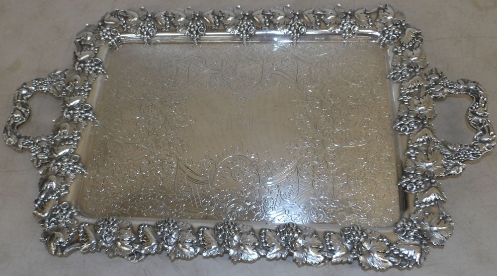 Ornate Silverplated Serving Tray with Grape & Cable Border: Ornate Silverplated Serving Tray with Grape & Cable Border. 31 1/4" x 18 1/2" ALL DESCRIPTIONS AND ANY CONDITION STATEMENT GIVEN BY LANGSTON AUCTION GALLERY ARE STRICTLY OPINIONS AND LANGSTON'S