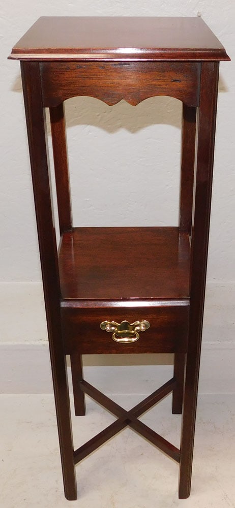 Mahogany Two Tier Fern Stand: Mahogany Two Tier Fern Stand . 32" H 10 1/4" Dia. ALL DESCRIPTIONS AND ANY CONDITION STATEMENT GIVEN BY LANGSTON AUCTION GALLERY ARE STRICTLY OPINIONS AND LANGSTON'S SHALL HAVE NO RESPONSIBILITY