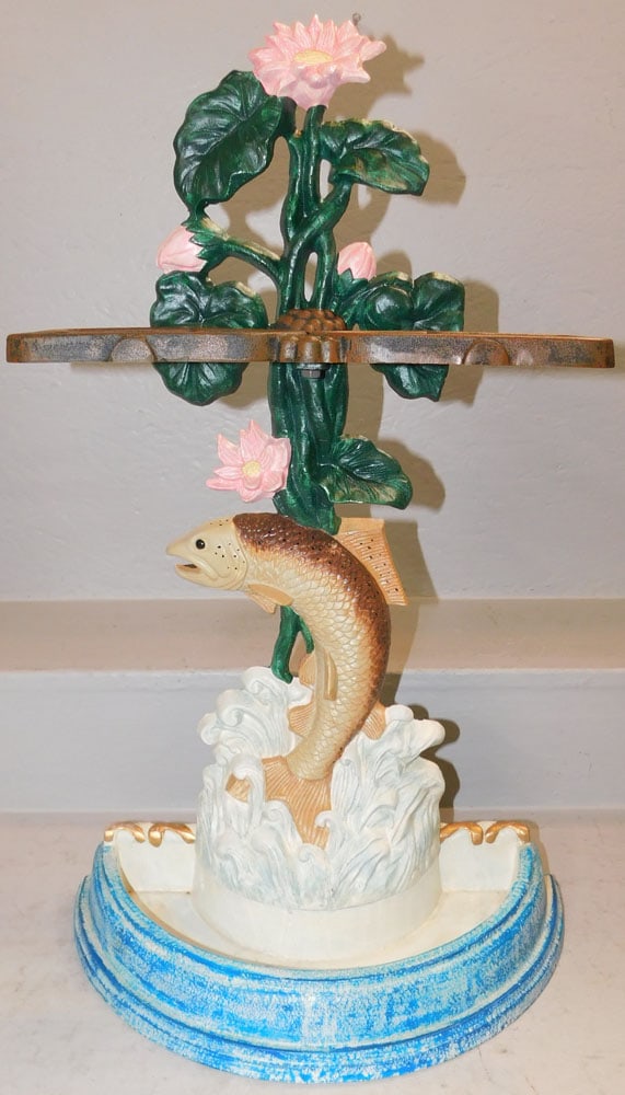 Painted Cast Iron Umbrella Stand with Jumping Fish Motif: Painted Cast Iron Umbrella Stand with Jumping Fish Motif . 26 3/4" H 16 1/2" W 8 1/4" D ALL DESCRIPTIONS AND ANY CONDITION STATEMENT GIVEN BY LANGSTON AUCTION GALLERY ARE STRICTLY OPINIONS AND LANGSTO