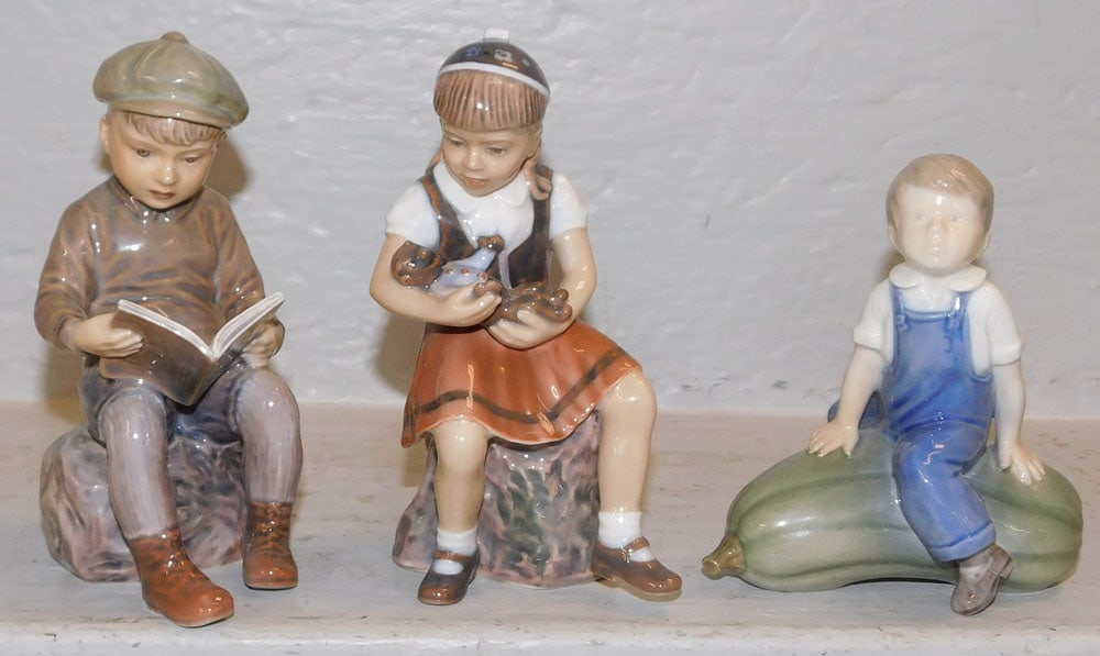 Three Copenhagen Porcelain Figurines: Three Copenhagen Porcelain Figurines. 5 3/4" H 3 1/4" W 3" D ALL DESCRIPTIONS AND ANY CONDITION STATEMENT GIVEN BY LANGSTON AUCTION GALLERY ARE STRICTLY OPINIONS AND LANGSTON'S SHALL HAVE NO RESPONSIB