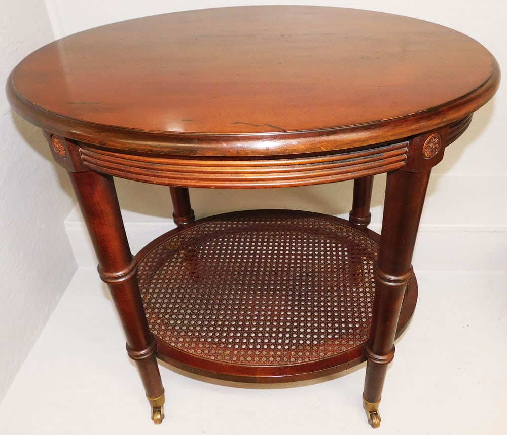 Oval Cherry & Cane Two Tier Faux Bamboo Stand by Ethan Allen: Oval Cherry & Cane Two Tier Faux Bamboo Stand by Ethan Allen. 25 1/4" H 28" W 23" D ALL DESCRIPTIONS AND ANY CONDITION STATEMENT GIVEN BY LANGSTON AUCTION GALLERY ARE STRICTLY OPINIONS AND