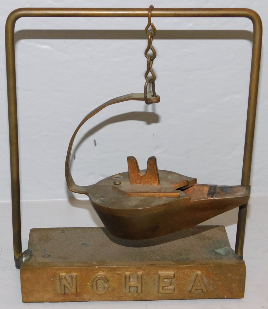 Cast Bronze Grease Lamp: Cast Bronze Grease Lamp. 8" H 7" W 4" D ALL DESCRIPTIONS AND ANY CONDITION STATEMENT GIVEN BY LANGSTON AUCTION GALLERY ARE STRICTLY OPINIONS AND LANGSTON'S SHALL HAVE NO RESPONSIBILITY FOR ERRORS OR