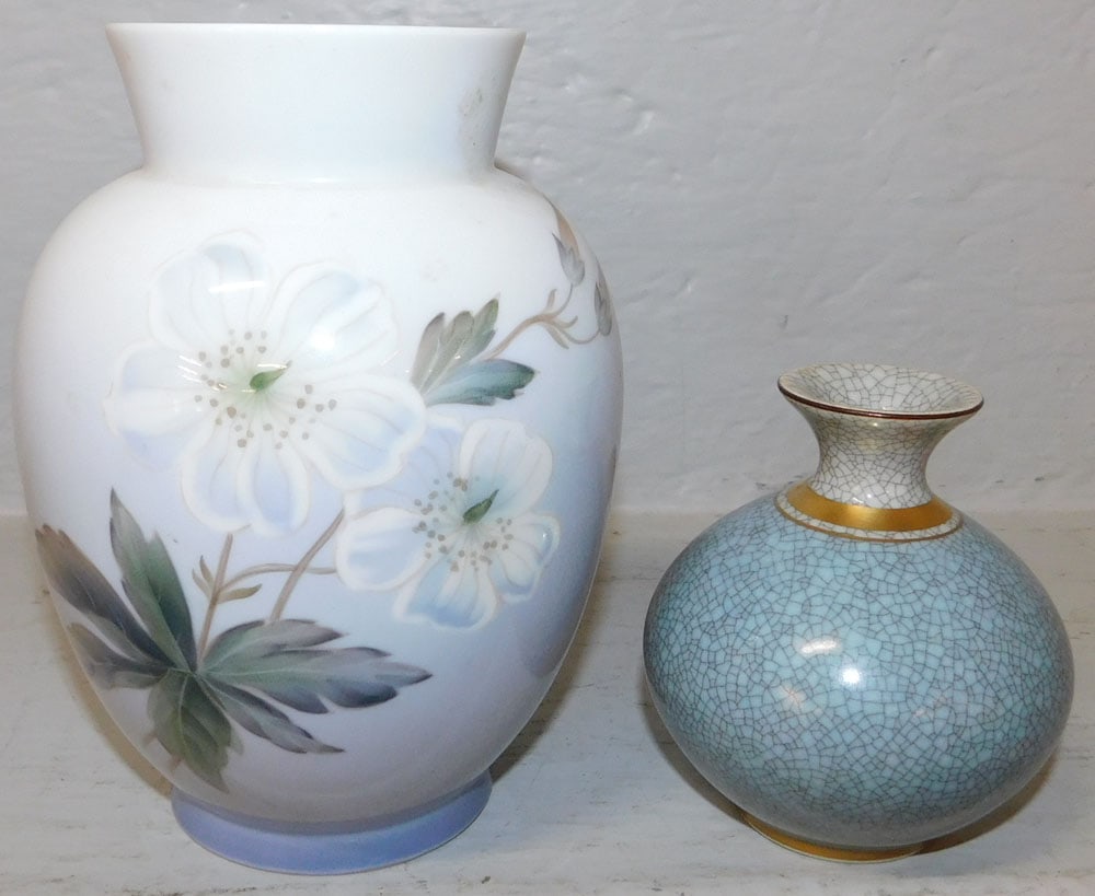 Two Royal Copenhagen Porcelain Vases: Two Royal Copenhagen Porcelain Vases . Up to 6 3/4" H 4 3/4" Dia. ALL DESCRIPTIONS AND ANY CONDITION STATEMENT GIVEN BY LANGSTON AUCTION GALLERY ARE STRICTLY OPINIONS AND LANGSTON'S SHALL HAVE NO