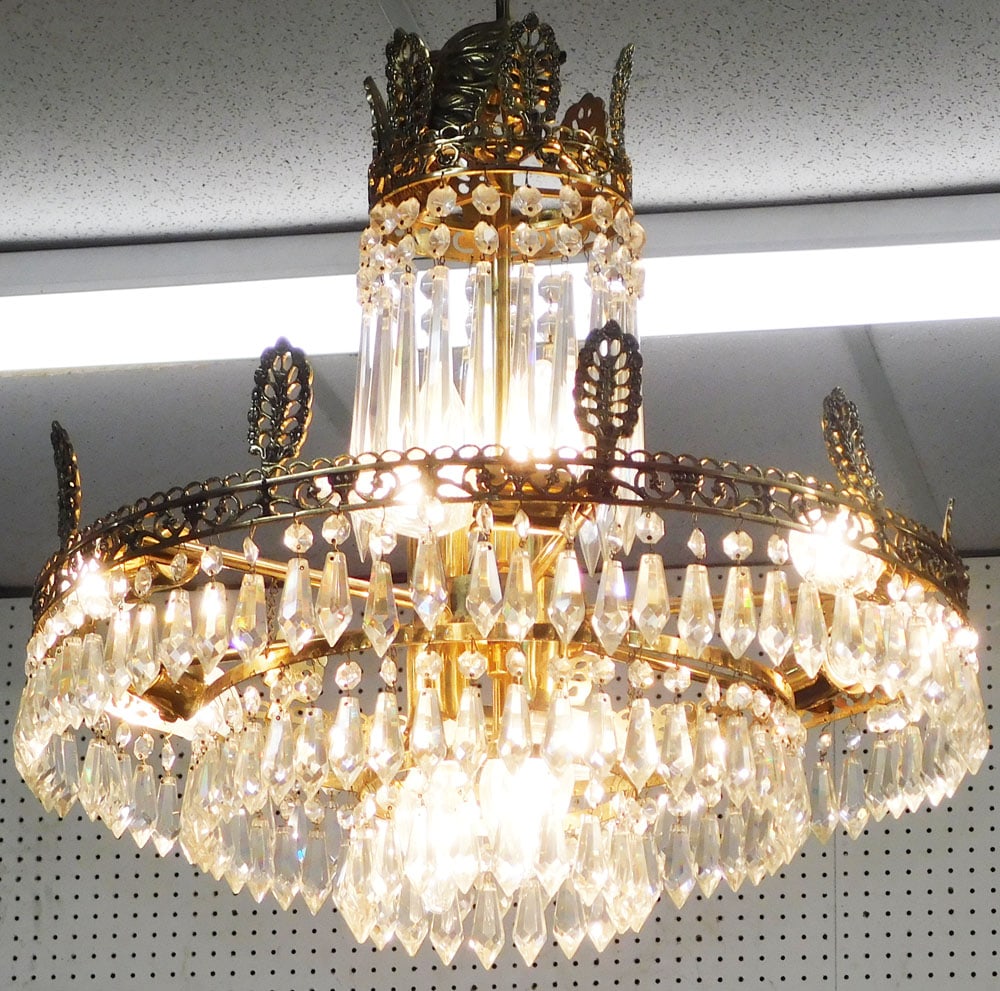 French Brass & Crystal Twelve Light Chandelier: French Brass & Crystal Twelve Light Chandelier . 21" H 21" Dia. ALL DESCRIPTIONS AND ANY CONDITION STATEMENT GIVEN BY LANGSTON AUCTION GALLERY ARE STRICTLY OPINIONS AND LANGSTON'S SHALL HAVE NO