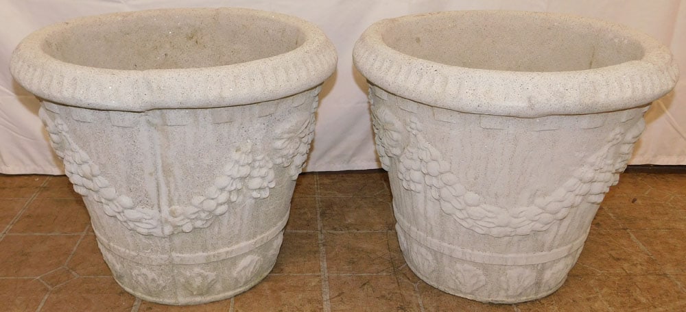 Pair of Cast Concrete Planters: Pair of Cast Concrete Planters . 16" H 19 1/4" Dia. ALL DESCRIPTIONS AND ANY CONDITION STATEMENT GIVEN BY LANGSTON AUCTION GALLERY ARE STRICTLY OPINIONS AND LANGSTON'S SHALL HAVE NO RESPONSIBILITY FOR