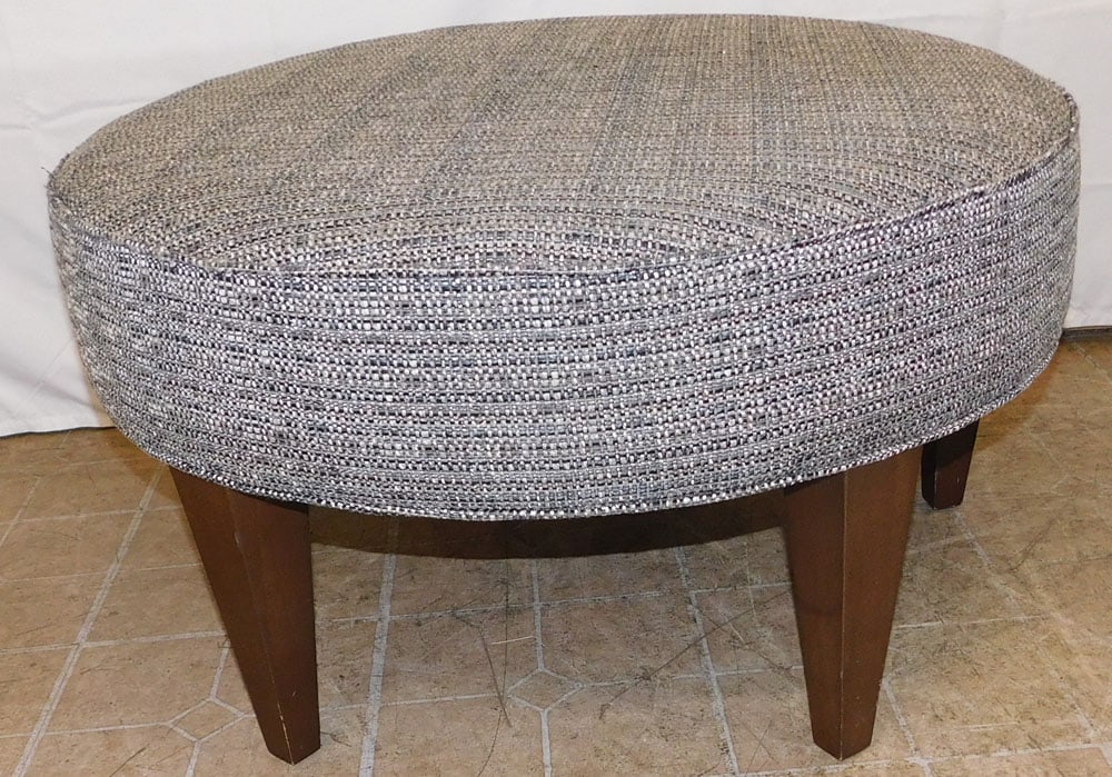 Modern Upholstered Top Round Ottoman: Modern Upholstered Top Round Ottoman . 18 1/2" H 34 1/2" Dia. ALL DESCRIPTIONS AND ANY CONDITION STATEMENT GIVEN BY LANGSTON AUCTION GALLERY ARE STRICTLY OPINIONS AND LANGSTON'S SHALL HAVE NO
