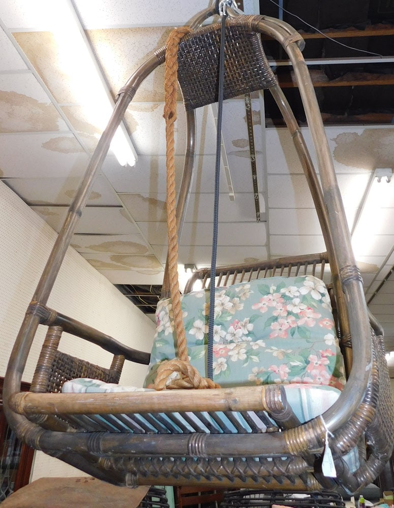 Hanging Rattan Chair: Hanging Rattan Chair . 52 1/2" H 29" W 31" D ALL DESCRIPTIONS AND ANY CONDITION STATEMENT GIVEN BY LANGSTON AUCTION GALLERY ARE STRICTLY OPINIONS AND LANGSTON'S SHALL HAVE NO RESPONSIBILITY FOR