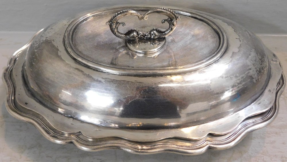 Antique Silver Covered Dish with Dolphin Motif Handle, (46.88 ozt.): Antique Silver Covered Dish with Dolphin Motif Handle, (46.88 ozt.). 5 1/4" H 13" W 9" D ALL DESCRIPTIONS AND ANY CONDITION STATEMENT GIVEN BY LANGSTON AUCTION GALLERY ARE STRICTLY OPINIONS AND LANGST