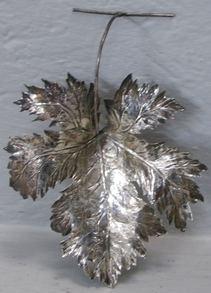 Large Sterling Maple Leaf Ornament: Large Sterling Maple Leaf Ornament . ALL DESCRIPTIONS AND ANY CONDITION STATEMENT GIVEN BY LANGSTON AUCTION GALLERY ARE STRICTLY OPINIONS AND LANGSTON'S SHALL HAVE NO RESPONSIBILITY FOR ERRORS OR