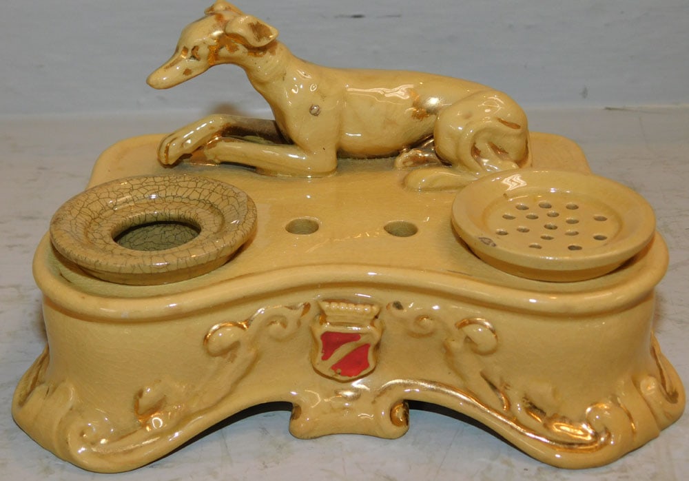 Antique Porcelain Whippet Ink Stand: Antique Porcelain Whippet Ink Stand . 3 1/4" H 6" W 4 1/2" D ALL DESCRIPTIONS AND ANY CONDITION STATEMENT GIVEN BY LANGSTON AUCTION GALLERY ARE STRICTLY OPINIONS AND LANGSTON'S SHALL HAVE NO