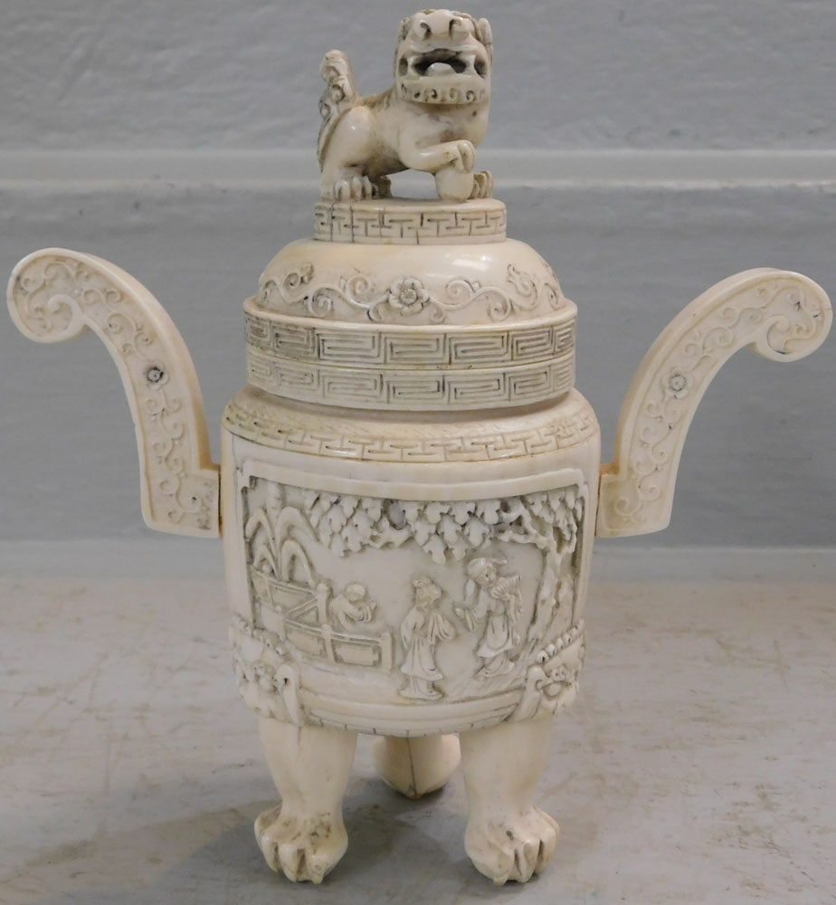 Carved Bone Covered Urn with Foo Dog Finial: Carved Bone Covered Urn with Foo Dog Finial . 8" H 7 1/4" W ALL DESCRIPTIONS AND ANY CONDITION STATEMENT GIVEN BY LANGSTON AUCTION GALLERY ARE STRICTLY OPINIONS AND LANGSTON'S SHALL HAVE NO