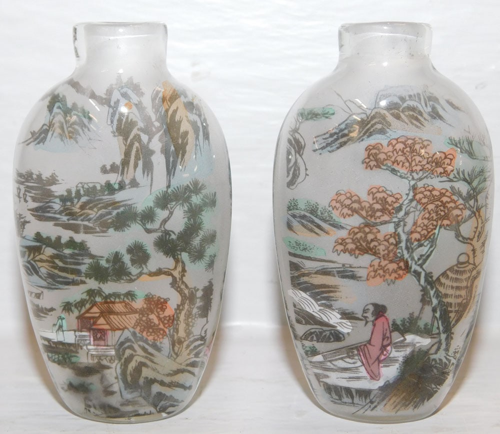 Pair of Reverse Painted Glass Snuff Bottles Signed with Character Marks: Pair of Reverse Painted Glass Snuff Bottles Signed with Character Marks. 2 3/4" H 1 1/2" W ALL DESCRIPTIONS AND ANY CONDITION STATEMENT GIVEN BY LANGSTON AUCTION GALLERY ARE STRICTLY OPINIONS AND