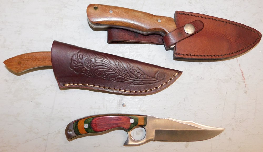 Three Knives, (Two with Leather Sheaths): Three Knives, (Two with Leather Sheaths) . Up to 9 3/4" L ALL DESCRIPTIONS AND ANY CONDITION STATEMENT GIVEN BY LANGSTON AUCTION GALLERY ARE STRICTLY OPINIONS AND LANGSTON'S SHALL HAVE NO