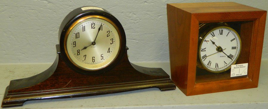 Quartz battery clock and 8 day shelf clock.: Quartz battery clock and a small New Haven 8 day shelf clock.