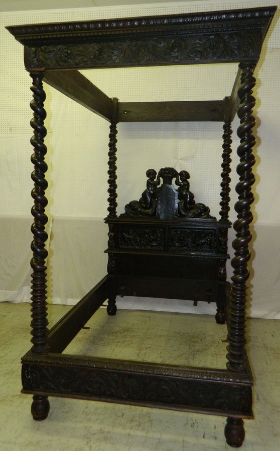 Carved Jacobean barley twist post canopy bed.: Fantastic carved Jacobean barley twist post canopy bed with dolphins and cupids.