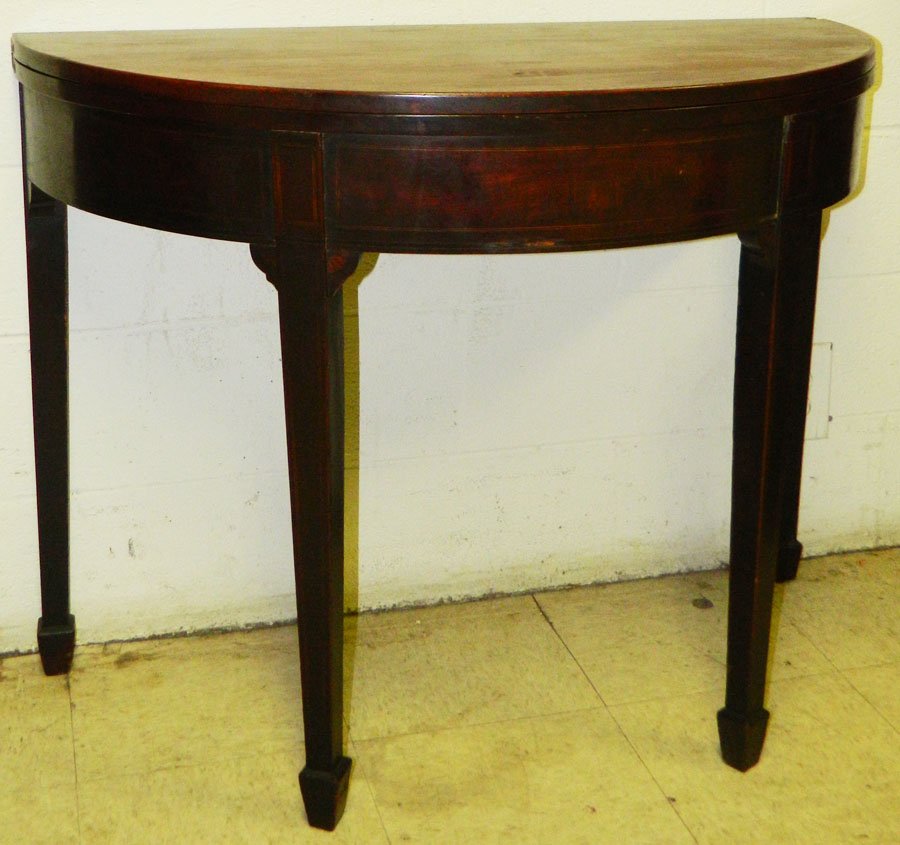Inlaid demilune mahogany fold over table.