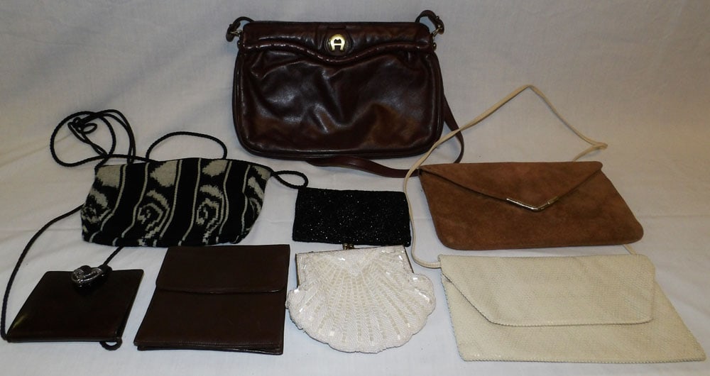 Lot of Ladies Purses: Lot of Ladies Purses . Up to 8 1/2" x 13" "ALL DESCRIPTIONS AND ANY CONDITION STATEMENT GIVEN BY LANGSTON AUCTION GALLERY ARE STRICTLY?OPINIONS?AND LANGSTON'S SHALL HAVE NO RESPONSIBILITY FOR ERRORS O
