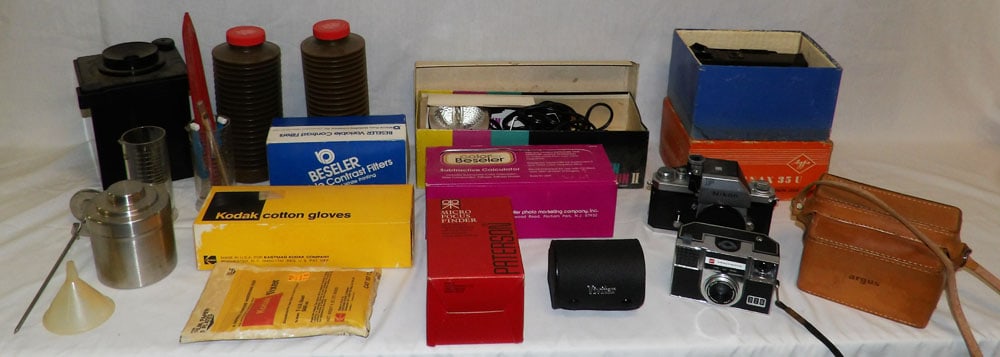 Lot of Cameras & Photo Development Items: Lot of Cameras & Photo Development Items . Up to 3 1/2" H 12 1/2" W 5 1/4" D "ALL DESCRIPTIONS AND ANY CONDITION STATEMENT GIVEN BY LANGSTON AUCTION GALLERY ARE STRICTLY?OPINIONS?AND LANGSTON'S SHALL