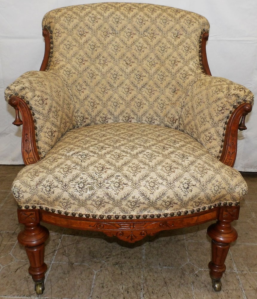 Carved Walnut & Upholstered Victorian Arm Chair: Carved Walnut & Upholstered Victorian Arm Chair . 31 1/2" H 29" W 27" D "ALL DESCRIPTIONS AND ANY CONDITION STATEMENT GIVEN BY LANGSTON AUCTION GALLERY ARE STRICTLY?OPINIONS?AND LANGSTON'S SHALL