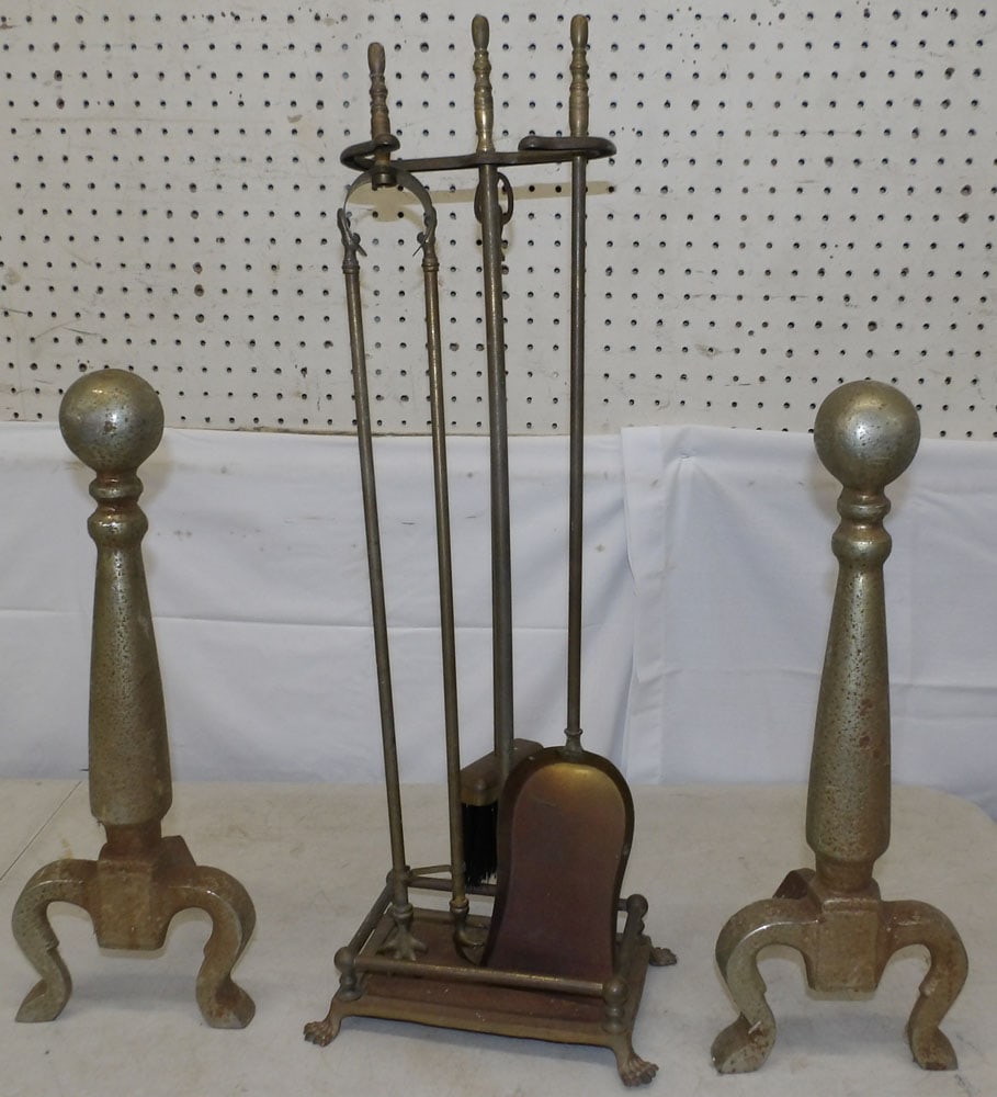 Pair of Cast Iron Andirons & Brass Fire Tools: Pair of Cast Iron Andirons & Brass Fire Tools . 27" H 10" W 7" D "ALL DESCRIPTIONS AND ANY CONDITION STATEMENT GIVEN BY LANGSTON AUCTION GALLERY ARE STRICTLY?OPINIONS?AND LANGSTON'S SHALL HAVE NO