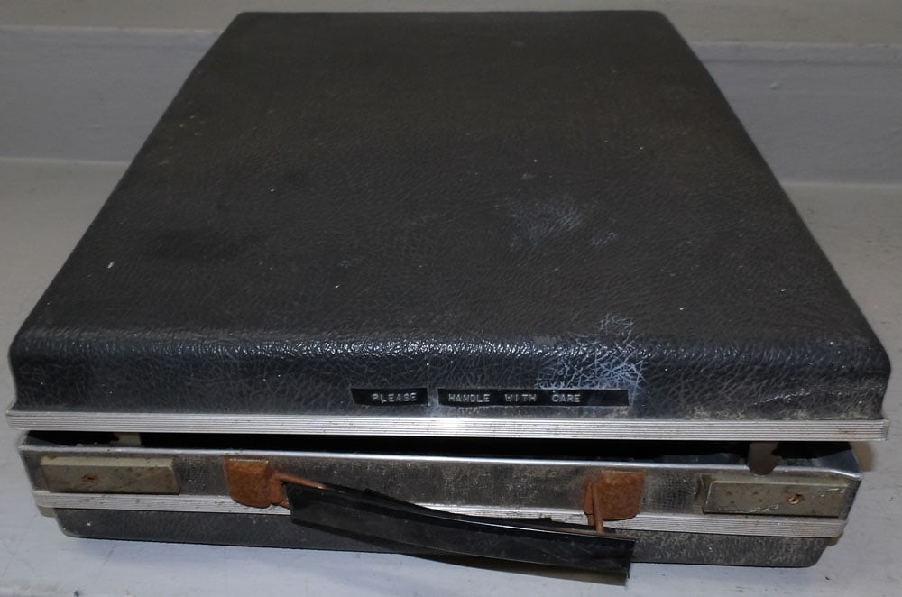 Vintage 3M Projector in Case: Vintage 3M Projector in Case. 8" H 16 1/2" W 19 1/2" D "ALL DESCRIPTIONS AND ANY CONDITION STATEMENT GIVEN BY LANGSTON AUCTION GALLERY ARE STRICTLY?OPINIONS?AND LANGSTON'S SHALL HAVE NO RESPONSIBILITY