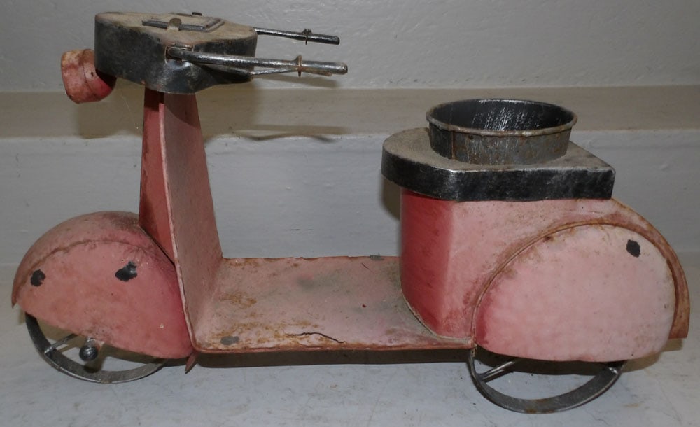 Painted Tole Scooter Form Planter: Painted Tole Scooter Form Planter . 11 3/4" H 21" W 7" D "ALL DESCRIPTIONS AND ANY CONDITION STATEMENT GIVEN BY LANGSTON AUCTION GALLERY ARE STRICTLY?OPINIONS?AND LANGSTON'S SHALL HAVE NO