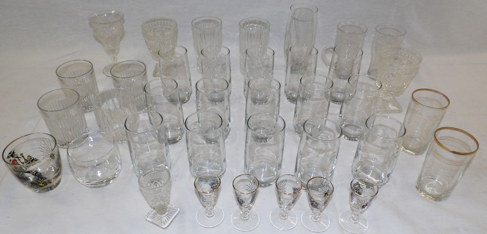 Lot of Glasses: Lot of Glasses . Up to 7" H 3" Dia. "ALL DESCRIPTIONS AND ANY CONDITION STATEMENT GIVEN BY LANGSTON AUCTION GALLERY ARE STRICTLY?OPINIONS?AND LANGSTON'S SHALL HAVE NO RESPONSIBILITY FOR ERRORS OR