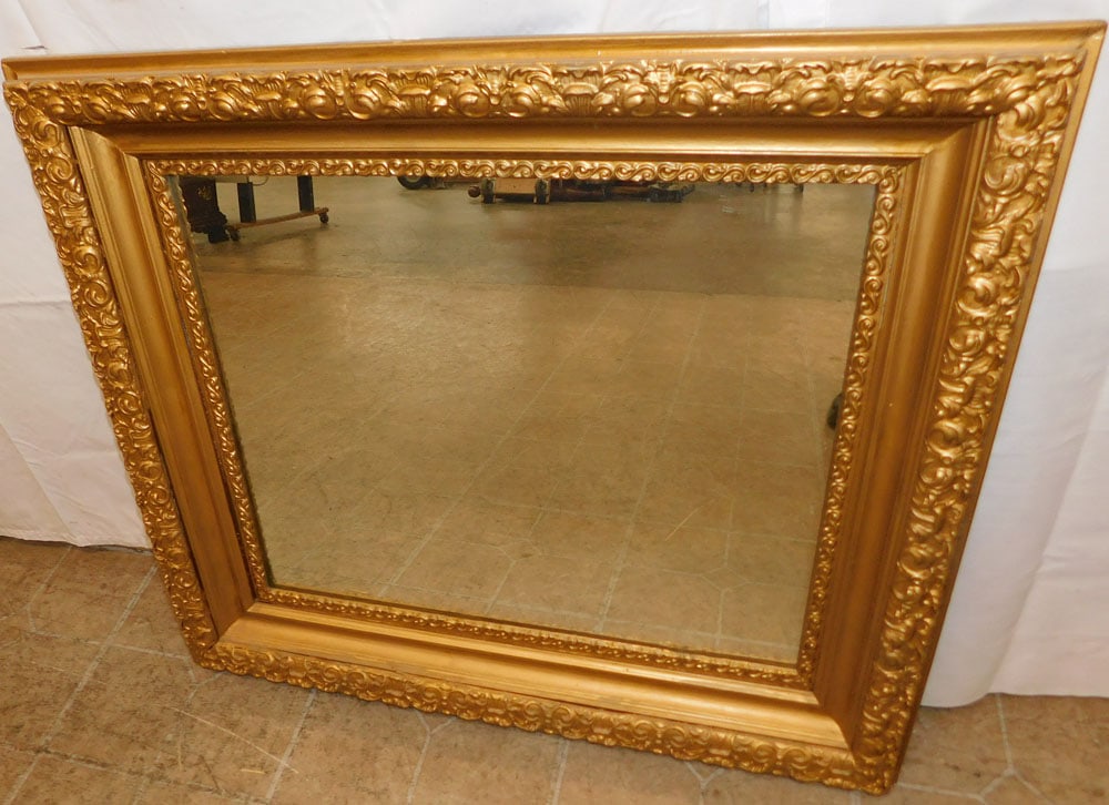 Ornate Gilded Frame Mirror: Ornate Gilded Frame Mirror. 28 1/4" x 32 1/4" "ALL DESCRIPTIONS AND ANY CONDITION STATEMENT GIVEN BY LANGSTON AUCTION GALLERY ARE STRICTLY?OPINIONS?AND LANGSTON'S SHALL HAVE NO RESPONSIBILITY FOR