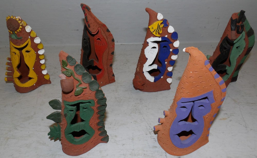 Lot of Pottery Collectible Figurines: Lot of Pottery Collectible Figurines . Up to 6 1/2" H 3" W 2" D "ALL DESCRIPTIONS AND ANY CONDITION STATEMENT GIVEN BY LANGSTON AUCTION GALLERY ARE STRICTLY?OPINIONS?AND LANGSTON'S SHALL HAVE NO