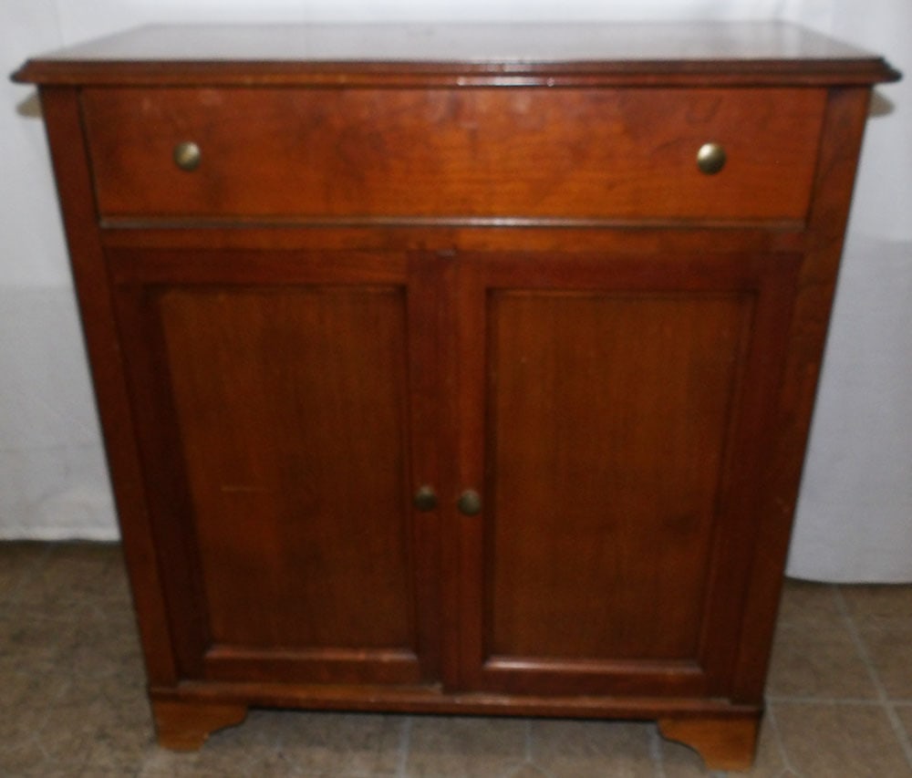 Cherry One Drawer Two Door Cabinet: Cherry One Drawer Two Door Cabinet . 31 1/4" H 29 1/2" W 14" D "ALL DESCRIPTIONS AND ANY CONDITION STATEMENT GIVEN BY LANGSTON AUCTION GALLERY ARE STRICTLY?OPINIONS?AND LANGSTON'S SHALL HAVE NO