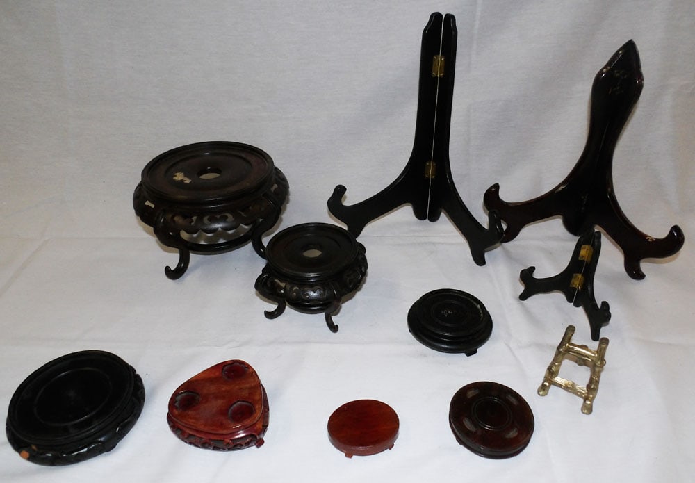 Lot of Oriental Teak Wood Stands: Lot of Oriental Teak Wood Stands . Up to 11" H 6" Dia. "ALL DESCRIPTIONS AND ANY CONDITION STATEMENT GIVEN BY LANGSTON AUCTION GALLERY ARE STRICTLY?OPINIONS?AND LANGSTON'S SHALL HAVE NO