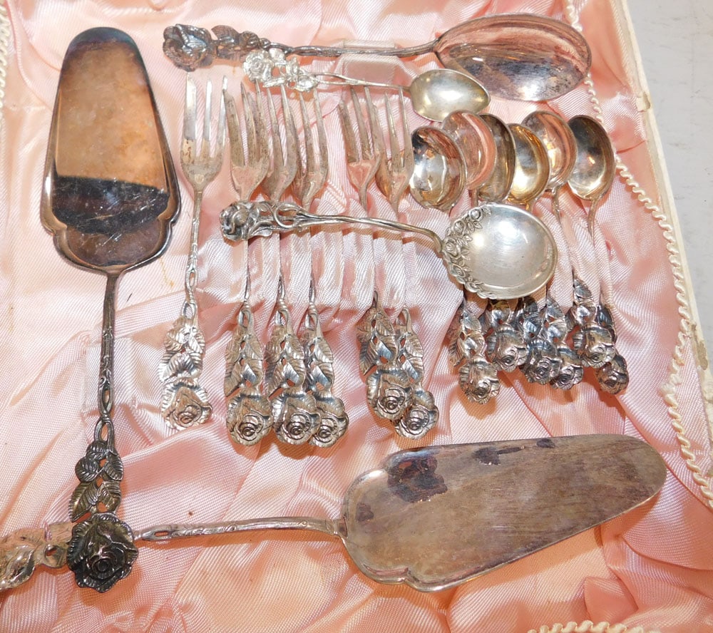 Lot of Silverplate Rose Dessert Spoons & Cake Servers: Lot of Silverplate Rose Dessert Spoons & Cake Servers . Up to 8 1/4" L "ALL DESCRIPTIONS AND ANY CONDITION STATEMENT GIVEN BY LANGSTON AUCTION GALLERY ARE STRICTLY?OPINIONS?AND LANGSTON'S SHALL
