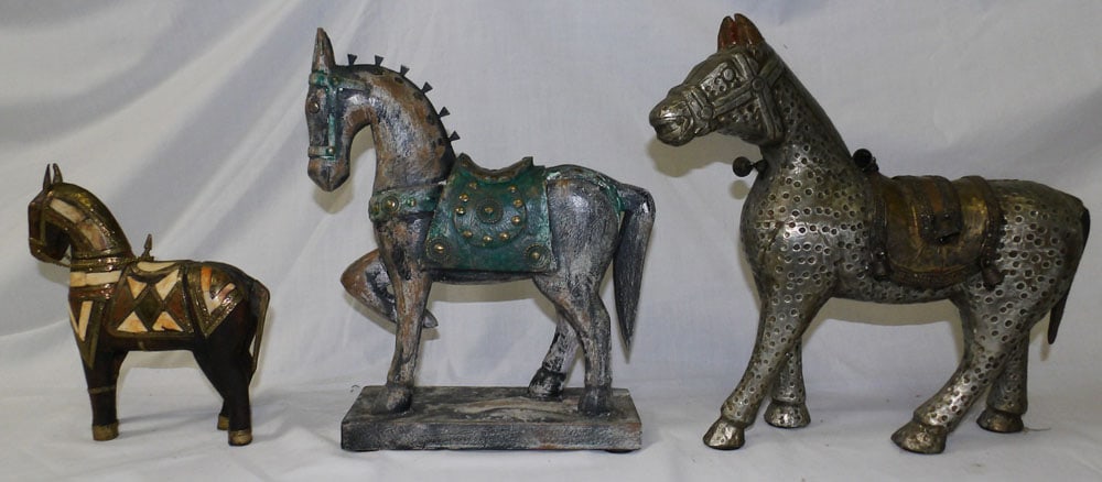 Three Carved Wood & Brass Bound Horse Figures: Three Carved Wood & Brass Bound Horse Figures. Up to 12" H 10" L ALL DESCRIPTIONS AND ANY CONDITION STATEMENT GIVEN BY LANGSTON AUCTION GALLERY ARE STRICTLY OPINIONS AND LANGSTON'S SHALL HAVE NO RESPO