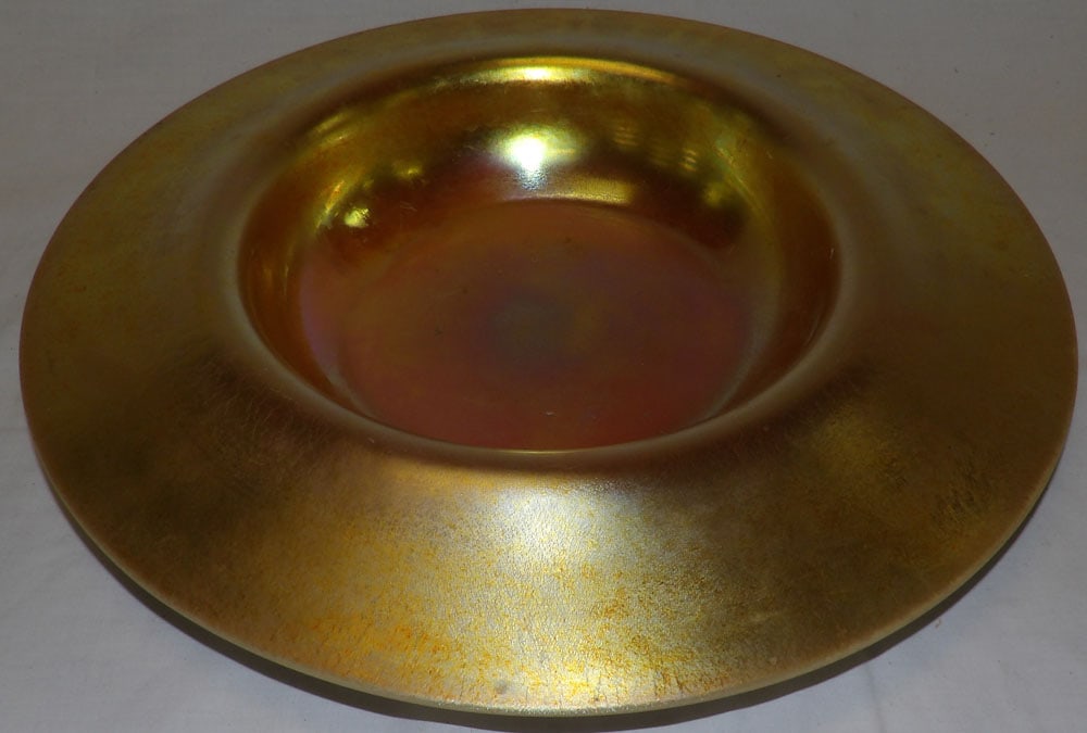Iridescent Art Glass Center Bowl: Iridescent Art Glass Center Bowl. 14 1/4" Dia. ALL DESCRIPTIONS AND ANY CONDITION STATEMENT GIVEN BY LANGSTON AUCTION GALLERY ARE STRICTLY OPINIONS AND LANGSTON'S SHALL HAVE NO RESPONSIBILITY FOR
