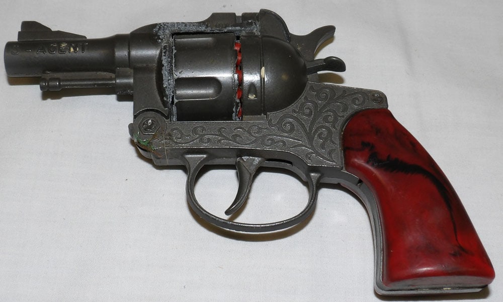 S-Agent Toy Gun: S-Agent Toy Gun . 6 1/4" L 4" W ALL DESCRIPTIONS AND ANY CONDITION STATEMENT GIVEN BY LANGSTON AUCTION GALLERY ARE STRICTLY OPINIONS AND LANGSTON'S SHALL HAVE NO RESPONSIBILITY FOR ERRORS OR OMISSIONS