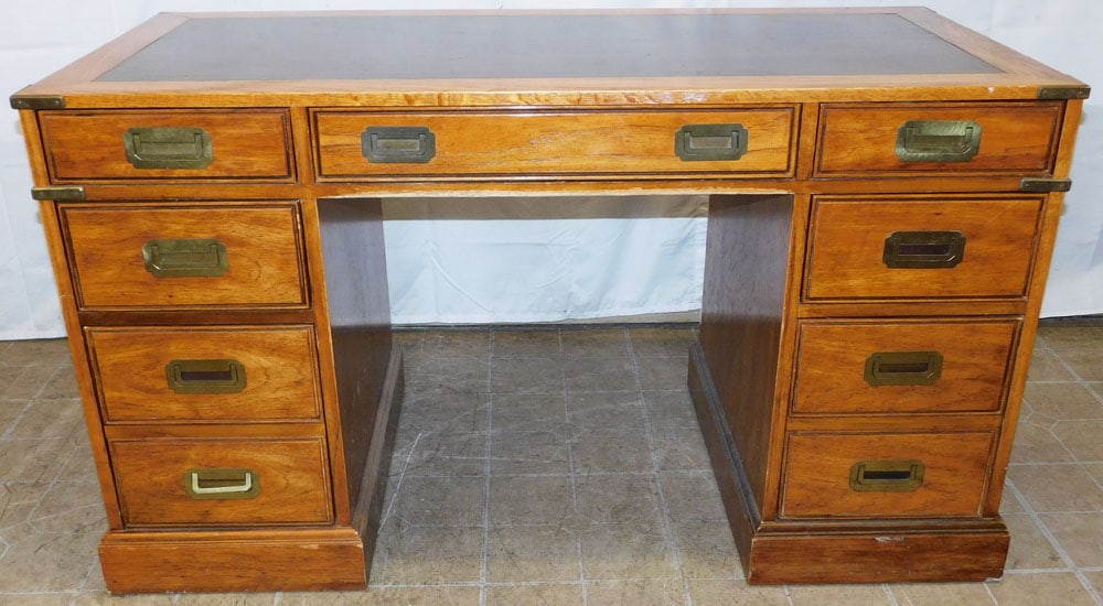 Chestnut Campaign Style Desk with Leather Top by National Mt. Airy: Chestnut Campaign Style Desk with Leather Top by National Mt. Airy. 29 3/4" H 52 1/4" W 24 1/4" D ALL DESCRIPTIONS AND ANY CONDITION STATEMENT GIVEN BY LANGSTON AUCTION GALLERY ARE STRICTLY OPINIONS A
