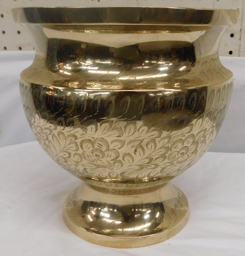 Brass Jardiniere: Brass Jardiniere . 8" H 7 1/4" Dia. ALL DESCRIPTIONS AND ANY CONDITION STATEMENT GIVEN BY LANGSTON AUCTION GALLERY ARE STRICTLY OPINIONS AND LANGSTON'S SHALL HAVE NO RESPONSIBILITY FOR ERRORS OR OMISS