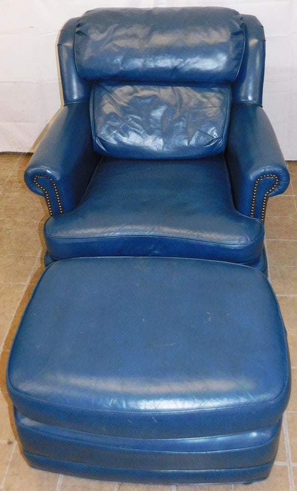 Leather Upholstered Arm Chair & Ottoman by Master Leather: Leather Upholstered Arm Chair & Ottoman by Master Leather . 36" H 34" W 39" D ALL DESCRIPTIONS AND ANY CONDITION STATEMENT GIVEN BY LANGSTON AUCTION GALLERY ARE STRICTLY OPINIONS AND LANGSTON'S SHALL