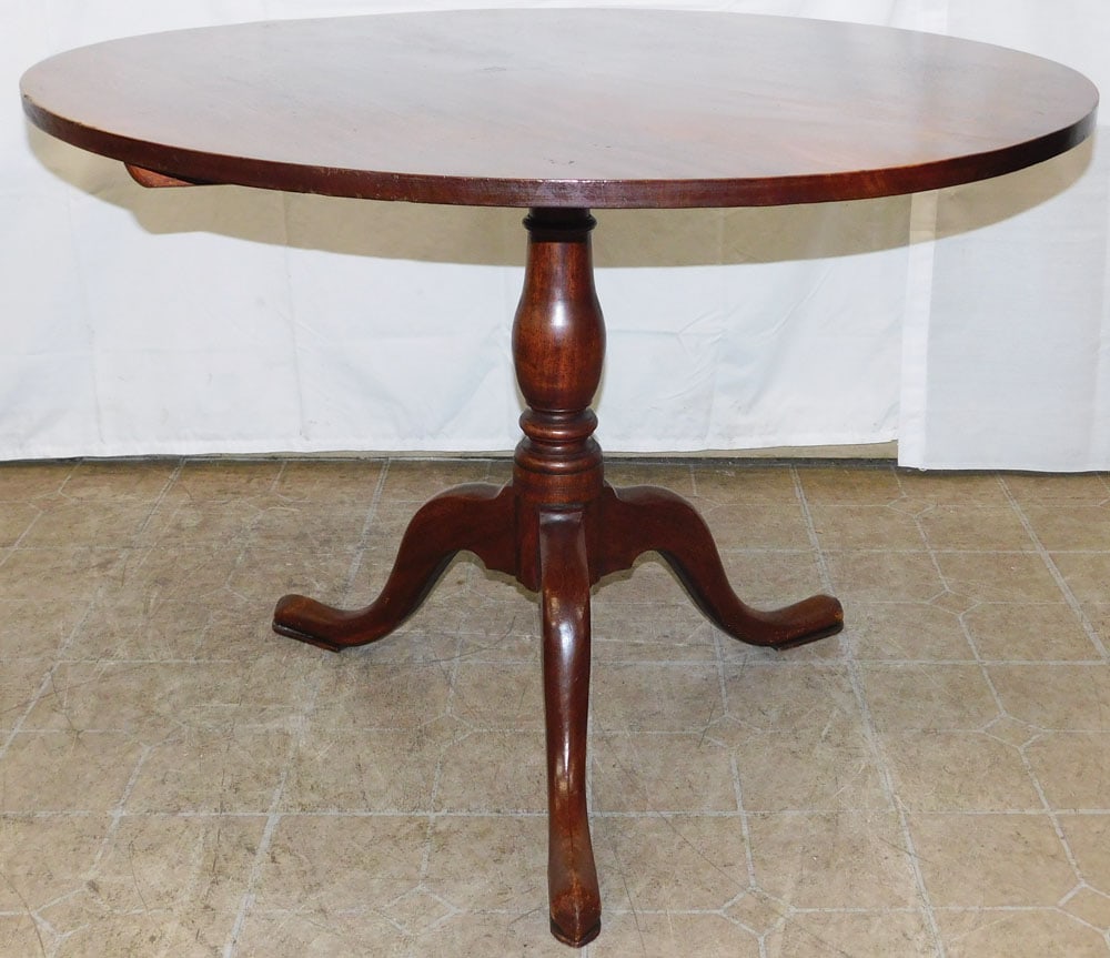 19th Century Mahogany Tilt Top Center Table: 19th Century Mahogany Tilt Top Center Table . 27 1/4" H 38 3/4" Dia. ALL DESCRIPTIONS AND ANY CONDITION STATEMENT GIVEN BY LANGSTON AUCTION GALLERY ARE STRICTLY OPINIONS AND LANGSTON'S SHALL HAVE NO R