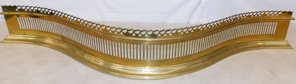 Brass Open Work Fireplace Fender Signed Williamsburg: Brass Open Work Fireplace Fender Signed Williamsburg. 6 1/2" H 49 1/4" W ALL DESCRIPTIONS AND ANY CONDITION STATEMENT GIVEN BY LANGSTON AUCTION GALLERY ARE STRICTLY OPINIONS AND LANGSTON'S SHALL HAVE 