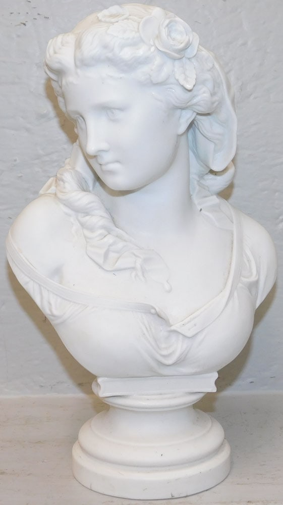 Parian Style Porcelain Bust of Woman: Parian Style Porcelain Bust of Woman. 12 3/4" H 8" W ALL DESCRIPTIONS AND ANY CONDITION STATEMENT GIVEN BY LANGSTON AUCTION GALLERY ARE STRICTLY OPINIONS AND LANGSTON'S SHALL HAVE NO RESPONSIBILITY