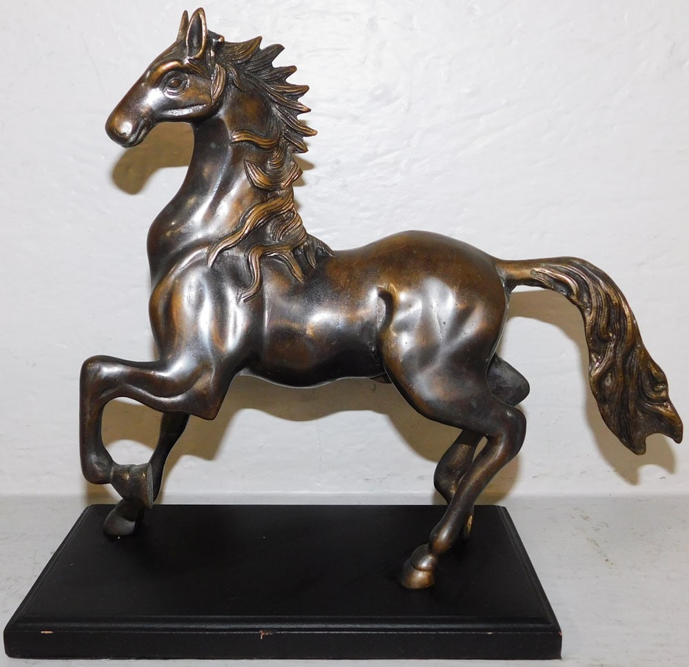 Brass Sculpture of Stallion on Painted Wood Base: Brass Sculpture of Stallion on Painted Wood Base. 11 1/4" H 12 1/2" W ALL DESCRIPTIONS AND ANY CONDITION STATEMENT GIVEN BY LANGSTON AUCTION GALLERY ARE STRICTLY OPINIONS AND LANGSTON'S SHALL HAVE NO