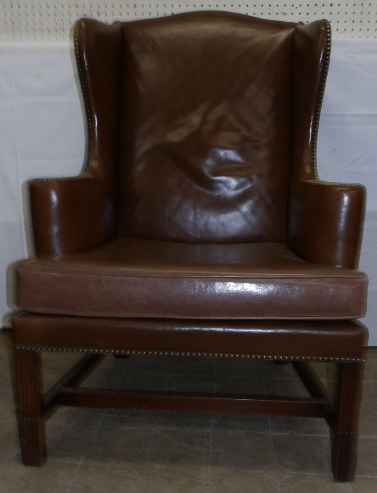 Leather & Faux Leather Cushion Wing Back Chair: Leather & Faux Leather Cushion Wing Back Chair . 45" H 31 3/4" W 26" D ALL DESCRIPTIONS AND ANY CONDITION STATEMENT GIVEN BY LANGSTON AUCTION GALLERY ARE STRICTLY OPINIONS AND LANGSTON'S SHALL HAVE
