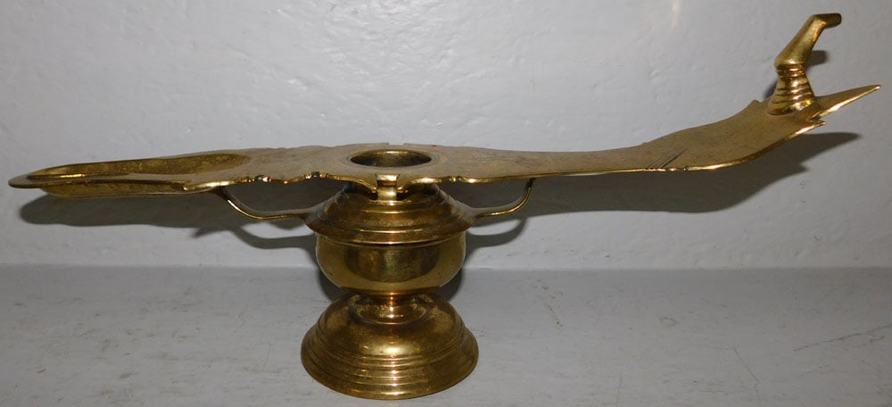 Antique Brass Changalavatta Ritual Oil Lamp: Antique Brass Changalavatta Ritual Oil Lamp. 8 1/4" H 19" W ALL DESCRIPTIONS AND ANY CONDITION STATEMENT GIVEN BY LANGSTON AUCTION GALLERY ARE STRICTLY OPINIONS AND LANGSTON'S SHALL HAVE NO