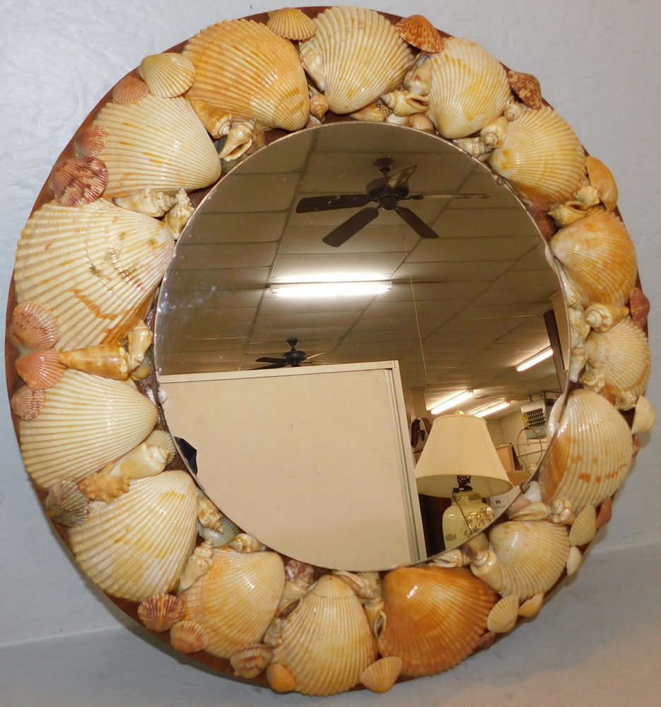 Seashell Framed Mirror: Seashell Framed Mirror. 18" Dia. ALL DESCRIPTIONS AND ANY CONDITION STATEMENT GIVEN BY LANGSTON AUCTION GALLERY ARE STRICTLY OPINIONS AND LANGSTON'S SHALL HAVE NO RESPONSIBILITY FOR ERRORS OR