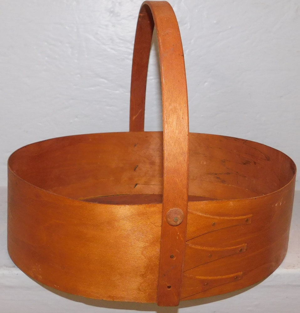 Maple Shaker Style Basket: Maple Shaker Style Basket . 10 1/2" H 12 1/2" W 11" D ALL DESCRIPTIONS AND ANY CONDITION STATEMENT GIVEN BY LANGSTON AUCTION GALLERY ARE STRICTLY OPINIONS AND LANGSTON'S SHALL HAVE NO RESPONSIBILITY